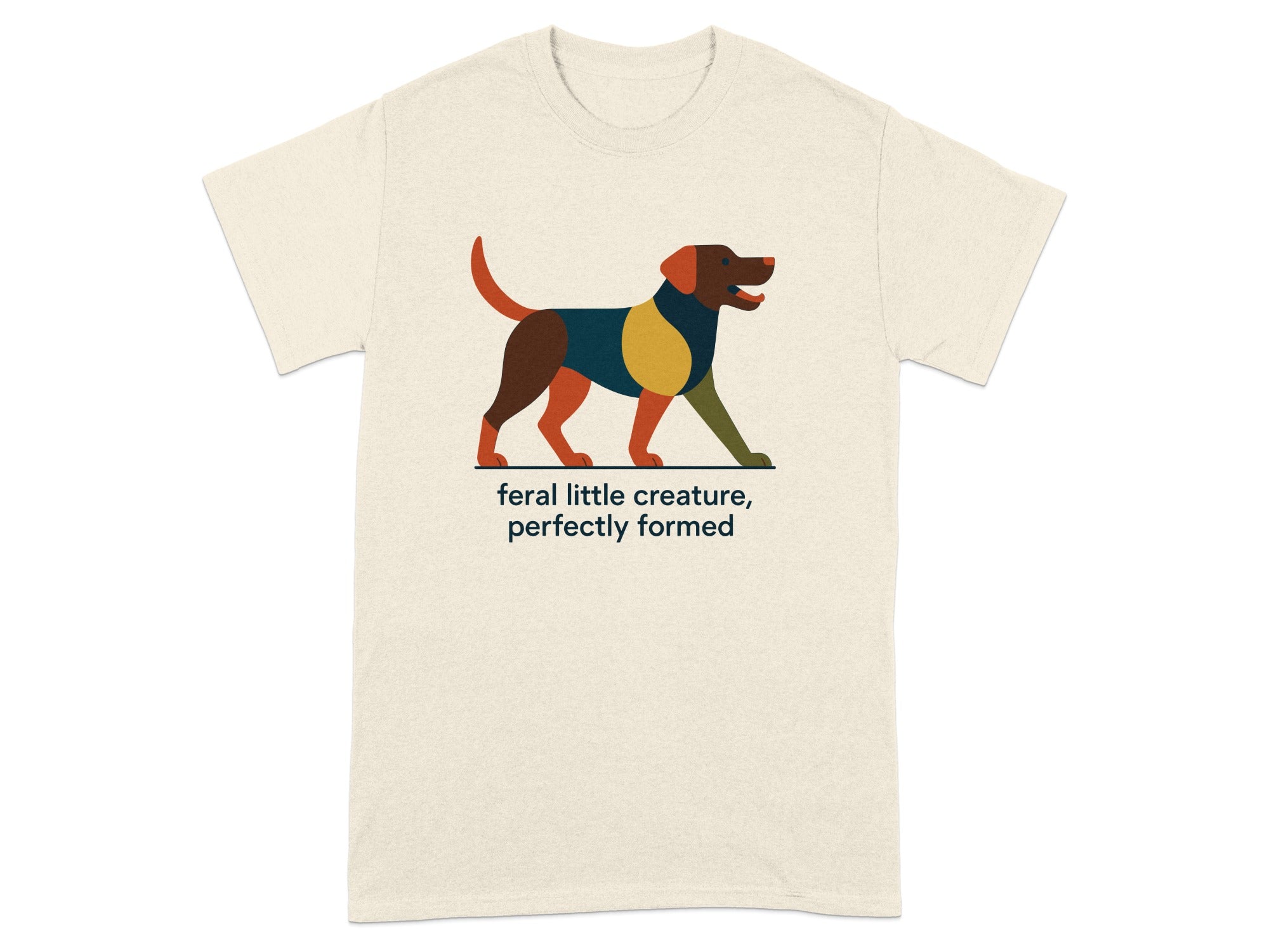 Cream t-shirt with abstract dog art and text "feral little creature, perfectly formed".