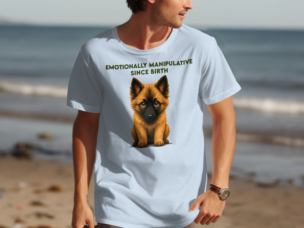 Light blue t-shirt with "EMOTIONALLY MANIPULATIVE SINCE BIRTH" and a puppy graphic.