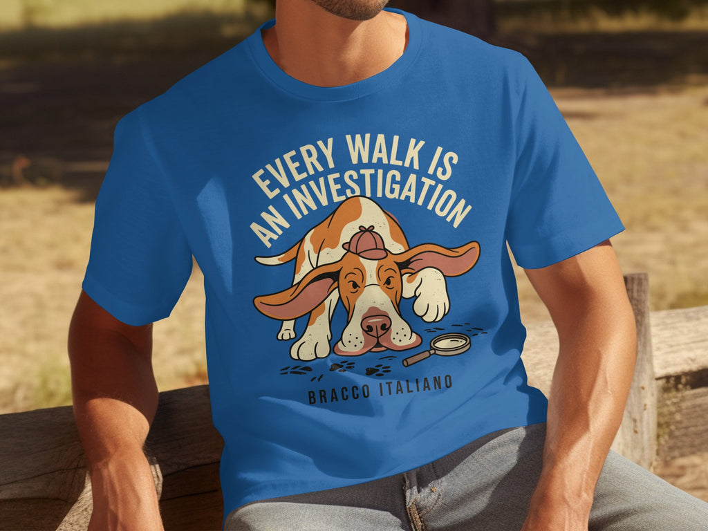 Blue t-shirt with a cartoon Bracco Italiano dog wearing a detective hat.