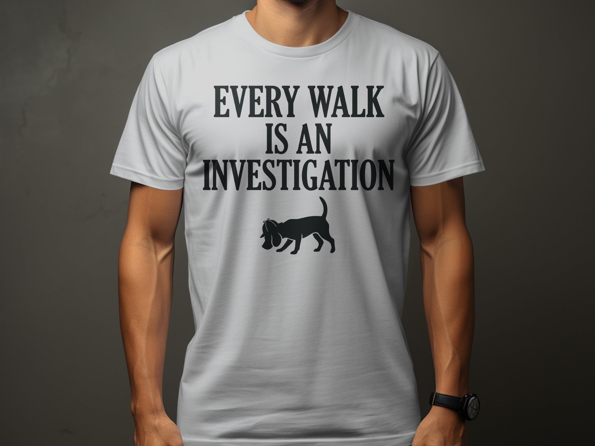 White t-shirt with black text "EVERY WALK IS AN INVESTIGATION" and a dog silhouette.
