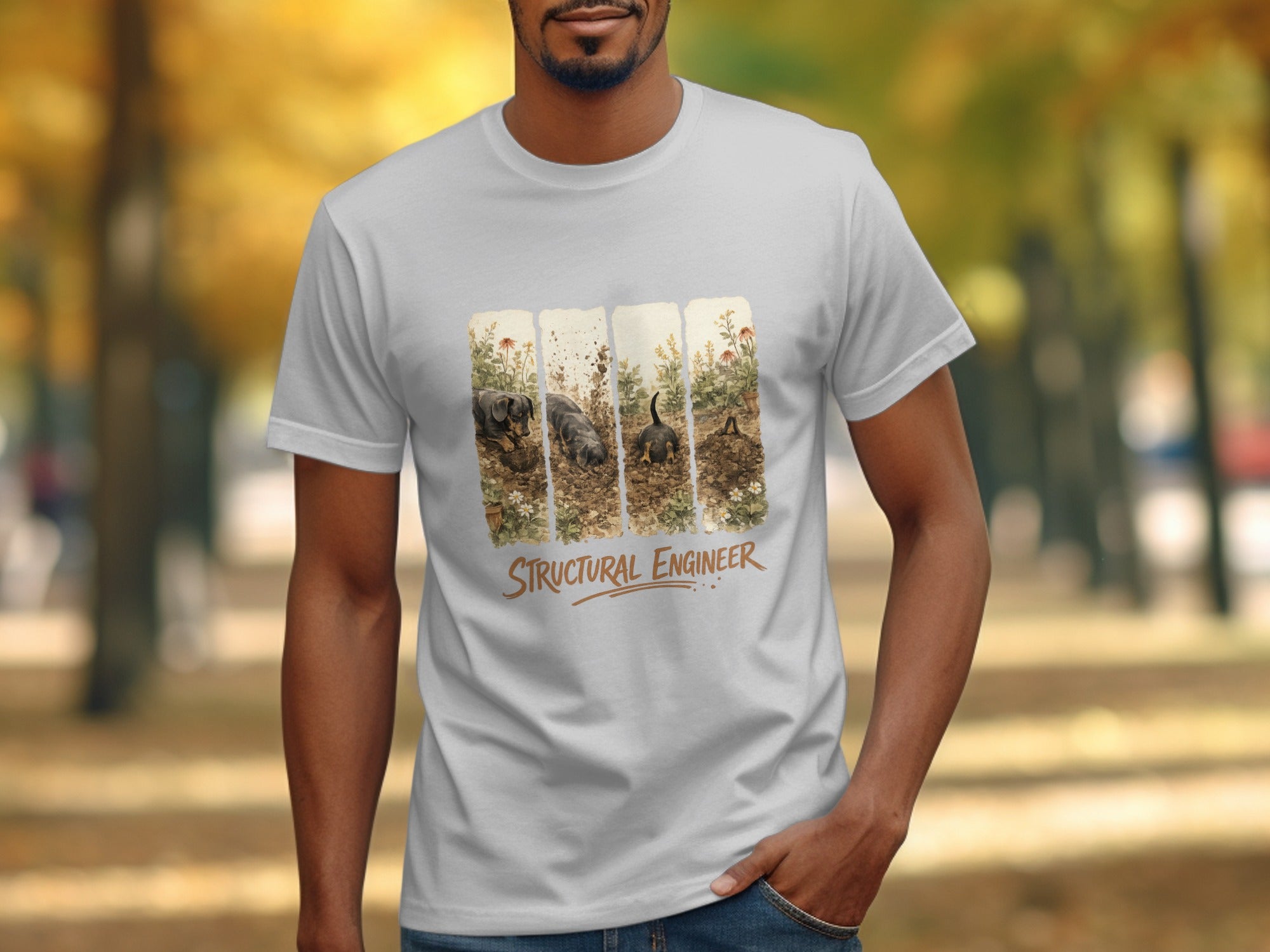 White t-shirt with illustration of dachshunds digging and text "STRUCTURAL ENGINEER."