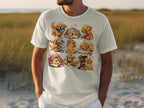 T-shirt with cartoon puppies reading books and playing with books.