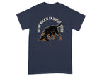 Navy t-shirt with a dog in a detective hat sniffing the ground.