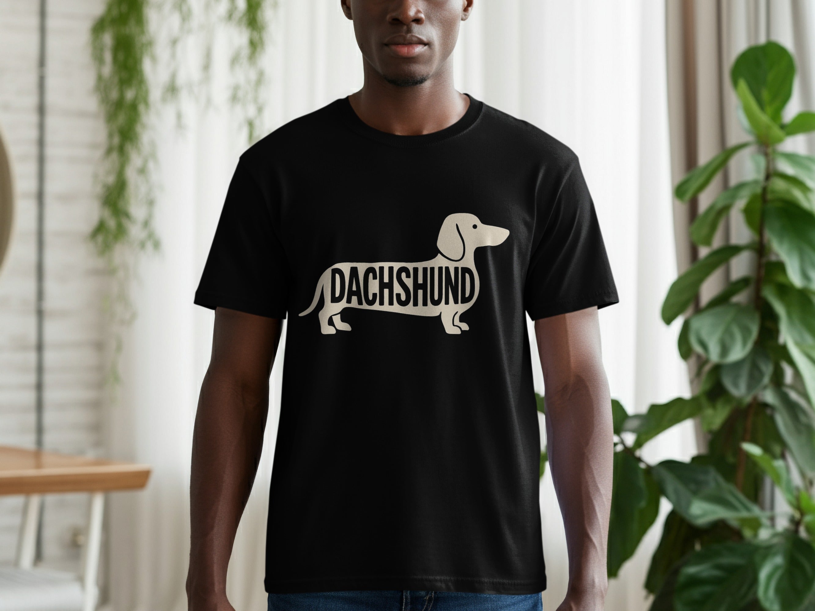 Black t-shirt with a light-colored dachshund graphic and "DACHSHUND" text.