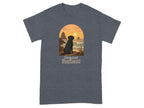 Black dog sitting by ocean at sunset with text "Paws And Reflect".
