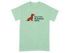 Light green t-shirt with a brown dachshund illustration and text reading "Sorry I Can't. My Dachshund Said No."