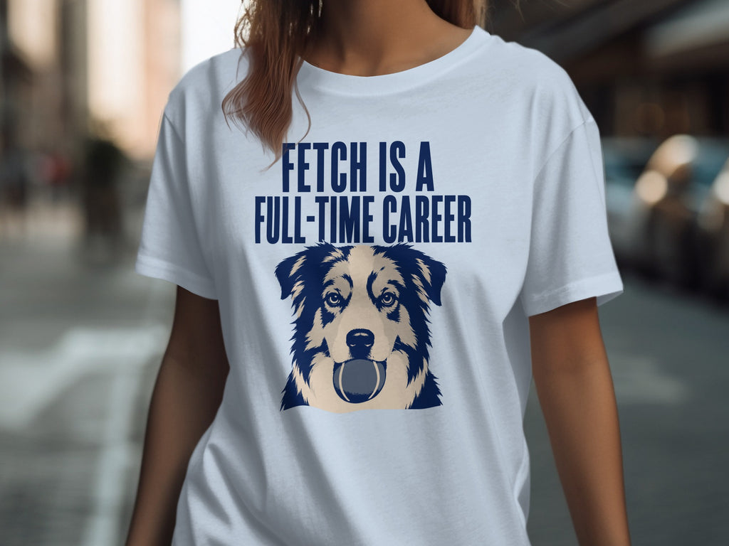 T-shirt with blue-eyed dog holding a tennis ball and text "FETCH IS A FULL-TIME CAREER".
