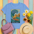 Surf's Golden Malibu Surfing Golden Retriever Dog T-Shirt in Carolina Blue