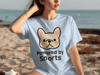 Light blue t-shirt with a French bulldog and "Powered by Snorts" text.
