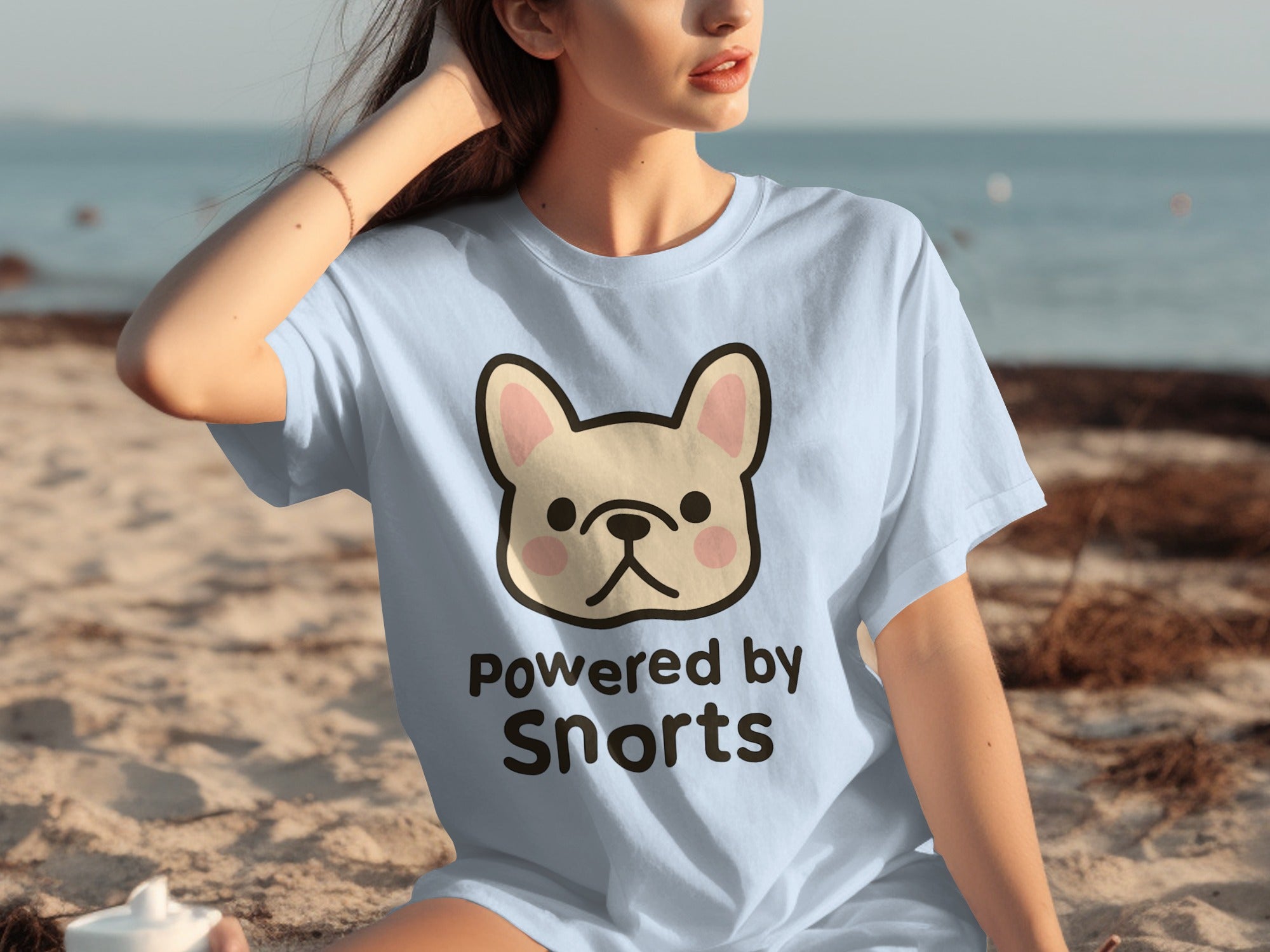 Light blue t-shirt with a French bulldog and "Powered by Snorts" text.