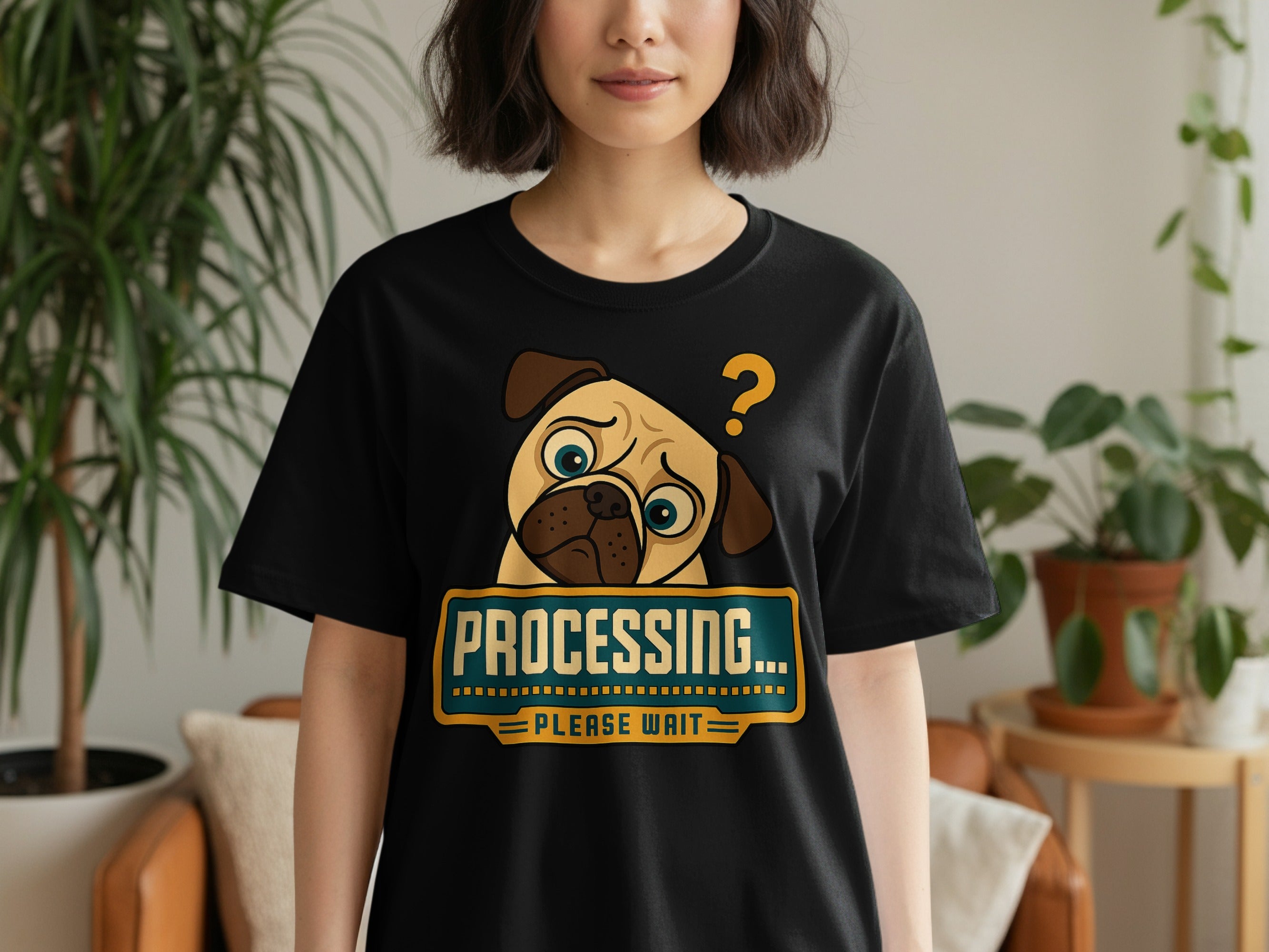 Black t-shirt with a pug graphic and text reading "PROCESSING... PLEASE WAIT".