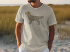 Cream t-shirt with golden retriever silhouette made of text.