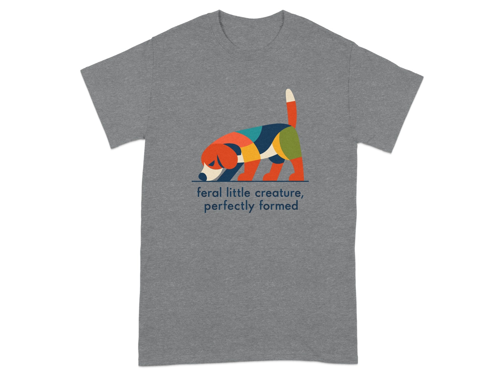 T-shirt with colorful abstract dog illustration and text "feral little creature, perfectly formed".