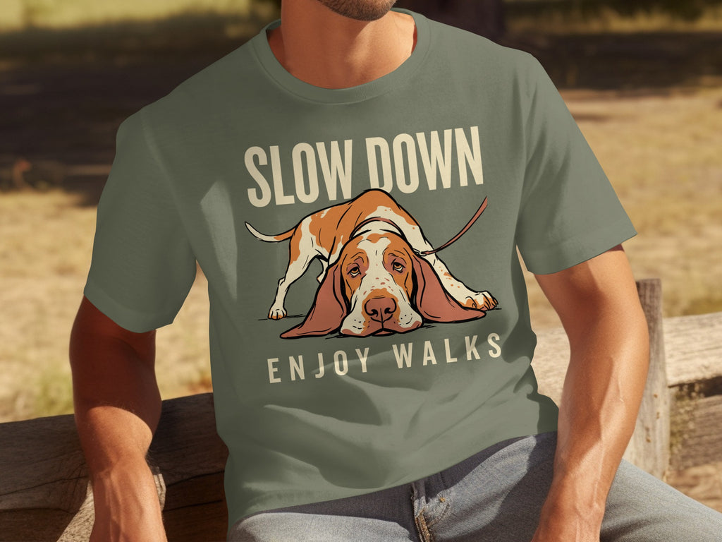T-shirt with a sad Basset Hound and text "SLOW DOWN ENJOY WALKS".