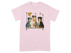 Three dogs, one wearing glasses, sit in a minimalist graphic on a pink t-shirt.