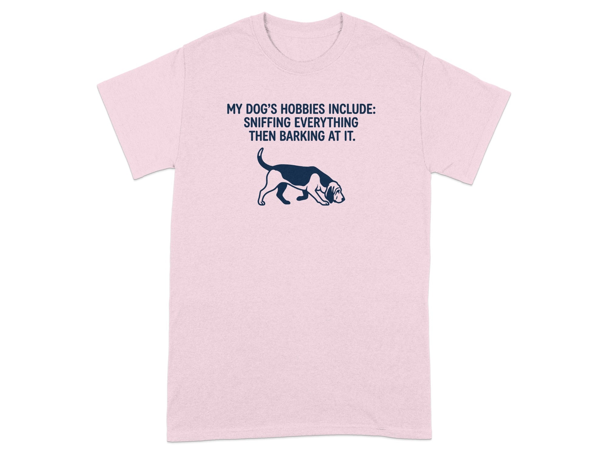 Pink t-shirt with text and a cartoon dog sniffing.