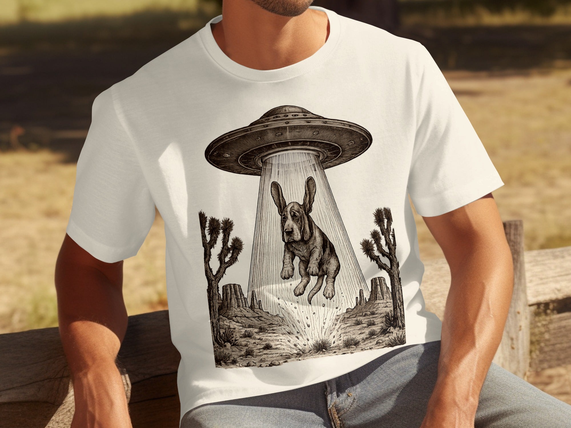 Basset hound being abducted by a UFO in a desert landscape.