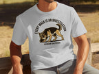White t-shirt with German Shepherd graphic and text "Every Walk is an Investigation".