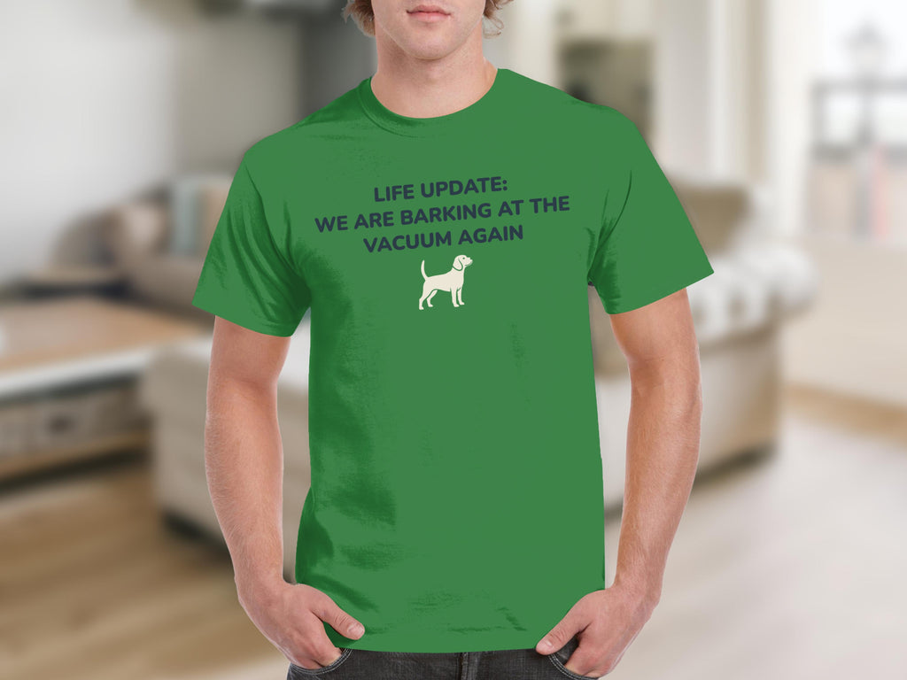Green t-shirt with "LIFE UPDATE: WE ARE BARKING AT THE VACUUM AGAIN" and a dog icon.