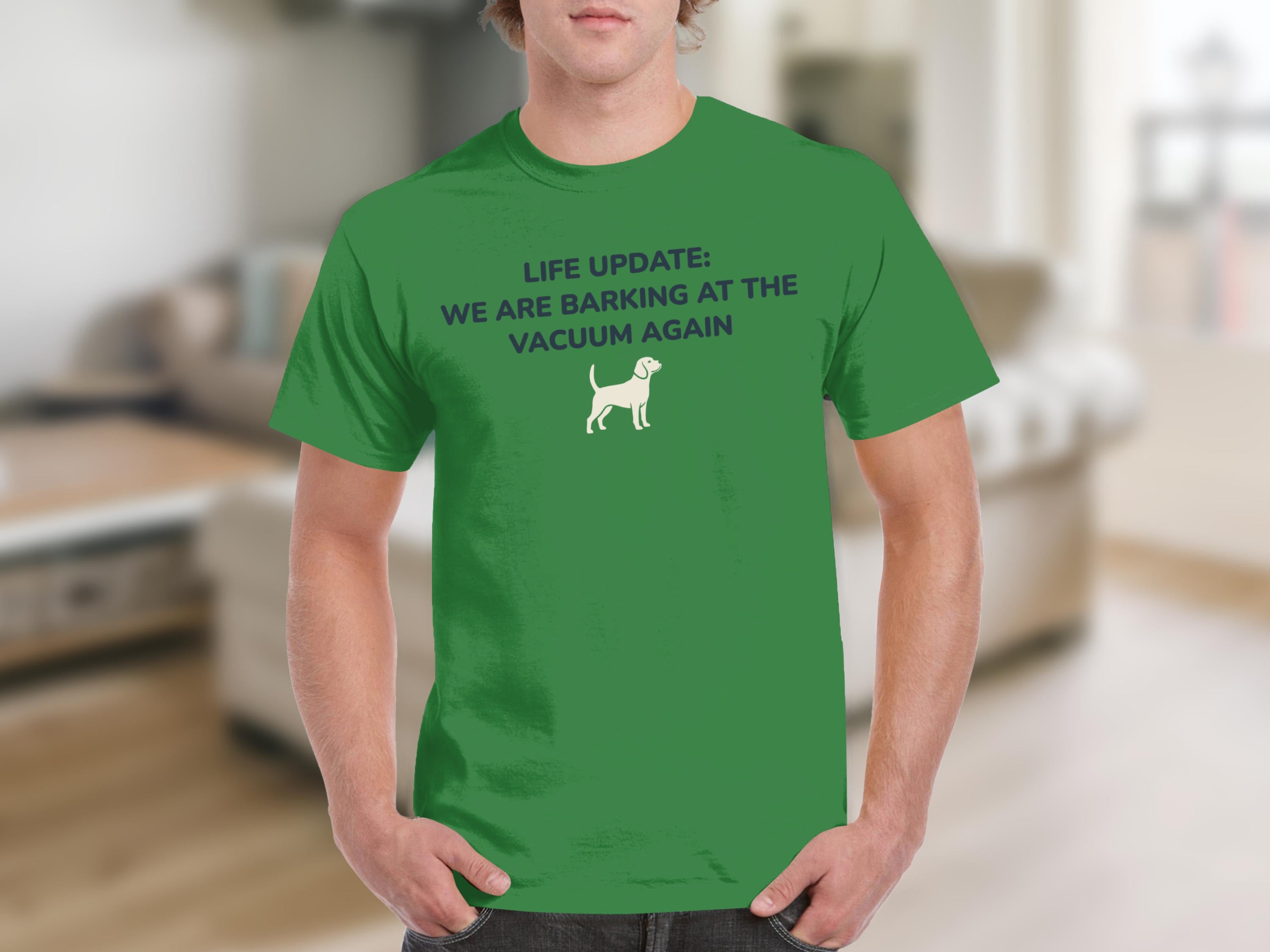 Green t-shirt with "LIFE UPDATE: WE ARE BARKING AT THE VACUUM AGAIN" and a dog icon.
