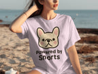 French bulldog graphic on light purple t-shirt, "Powered by Snorts" text.