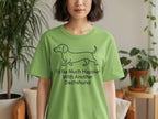 Green t-shirt with a line drawing of a dachshund and text "I'd Be Much Happier With Another Dachshund".