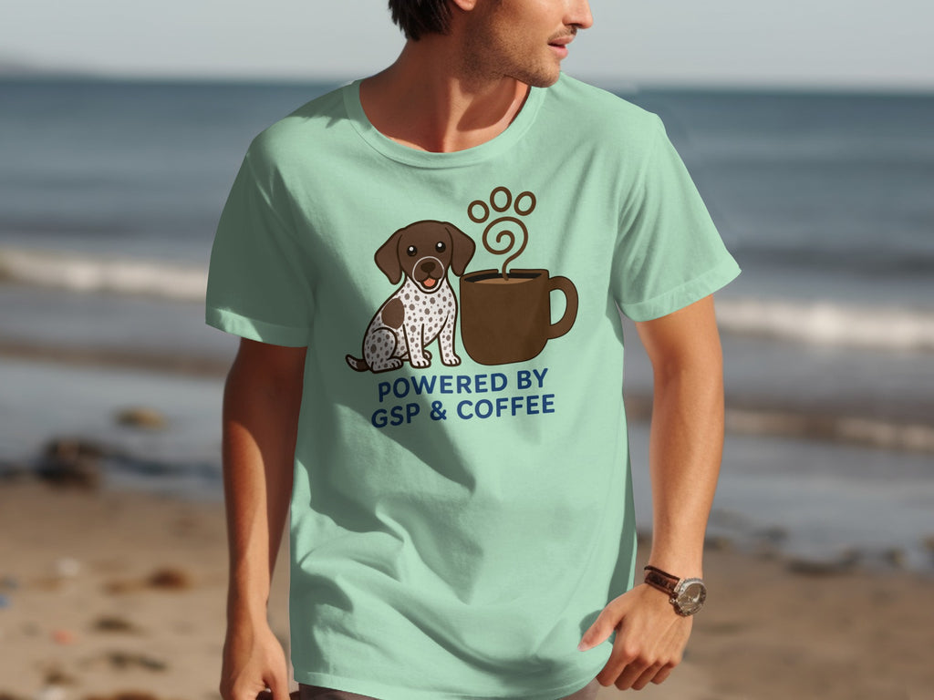 Light teal t-shirt with German Shorthaired Pointer and coffee cup graphic.
