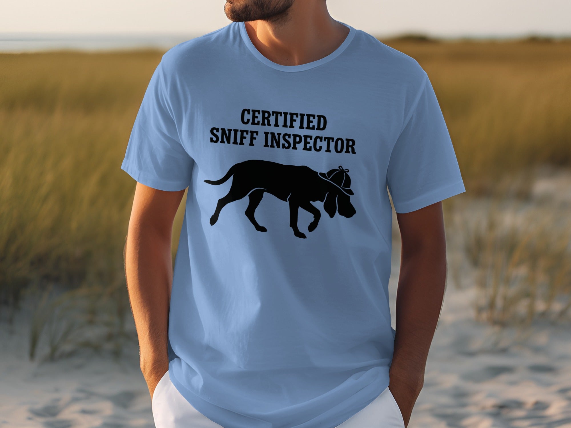 Light blue t-shirt with "Certified Sniff Inspector" and a dog graphic.
