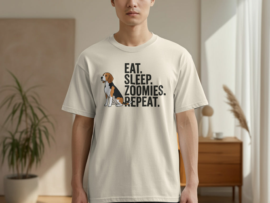 Beige t-shirt with "EAT. SLEEP. ZOOMIES. REPEAT." and a beagle.