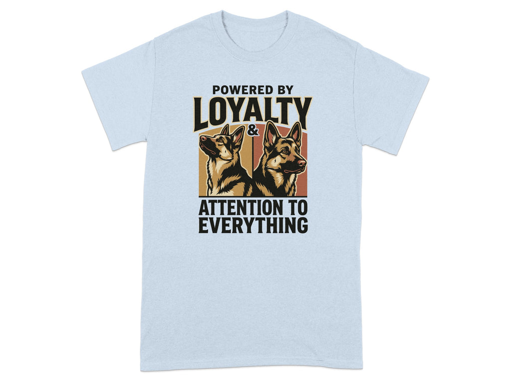 Light blue t-shirt with German Shepherd heads and text: "Powered by Loyalty & Attention to Everything".