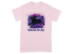 Pink t-shirt with black dog artwork and text "Unleash the Joy".