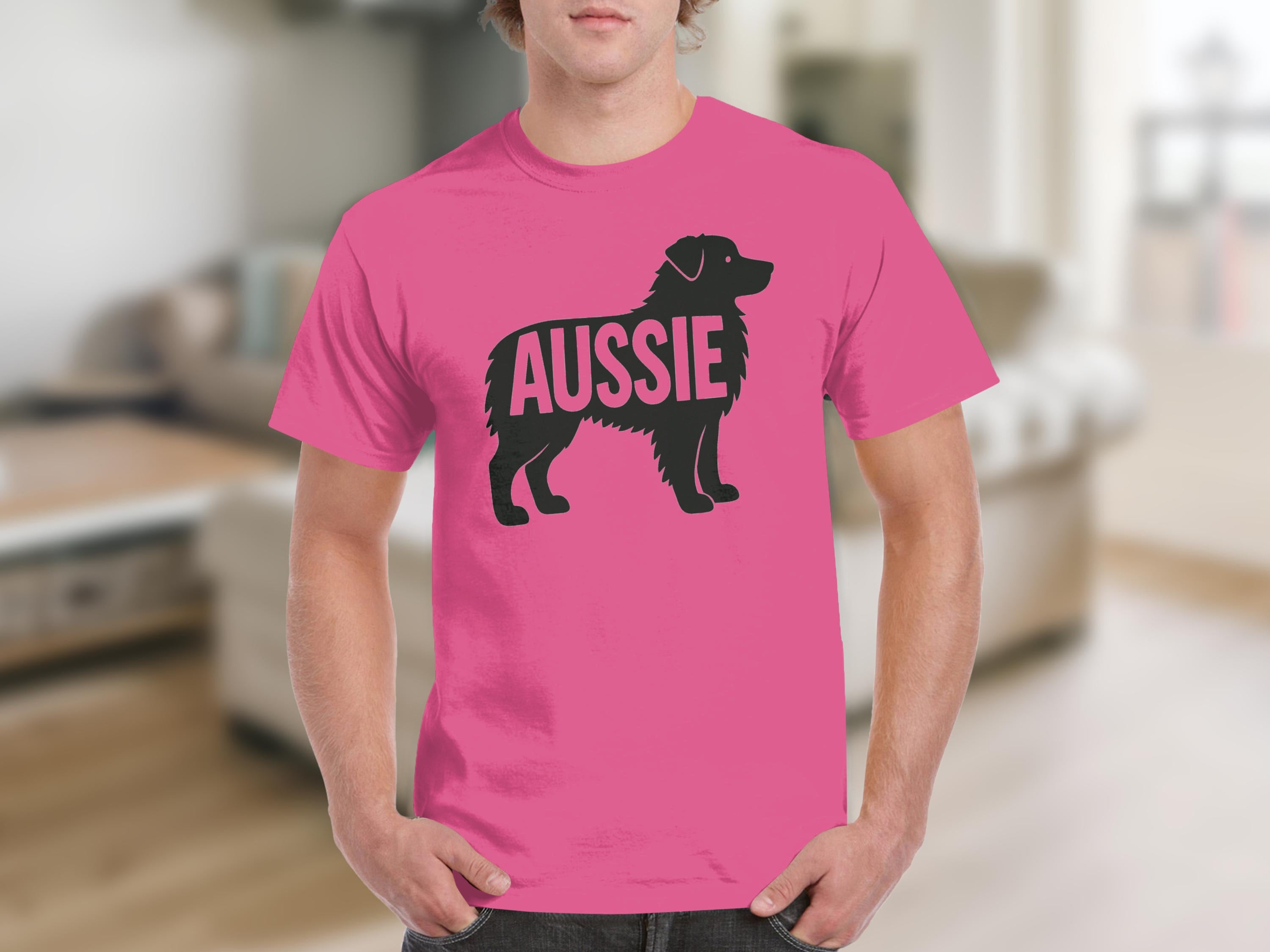 Pink t-shirt with a black silhouette of an Australian Shepherd dog and the word "AUSSIE".