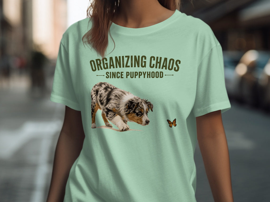 Mint green t-shirt with "ORGANIZING CHAOS SINCE PUPPYHOOD" and a puppy.