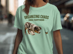 Mint green t-shirt with "ORGANIZING CHAOS SINCE PUPPYHOOD" and a puppy.