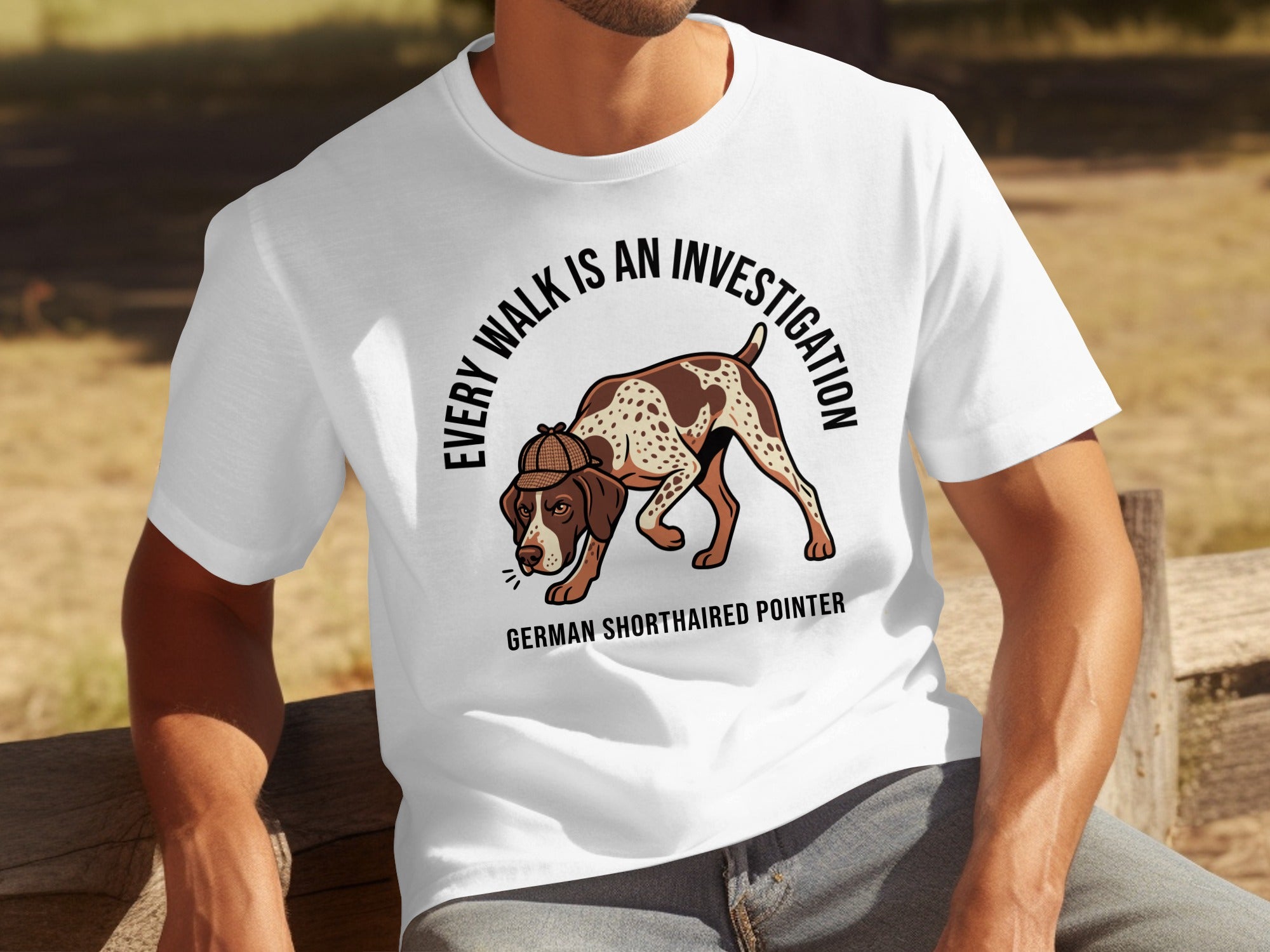 German Shorthaired Pointer wearing a deerstalker hat on a t-shirt.