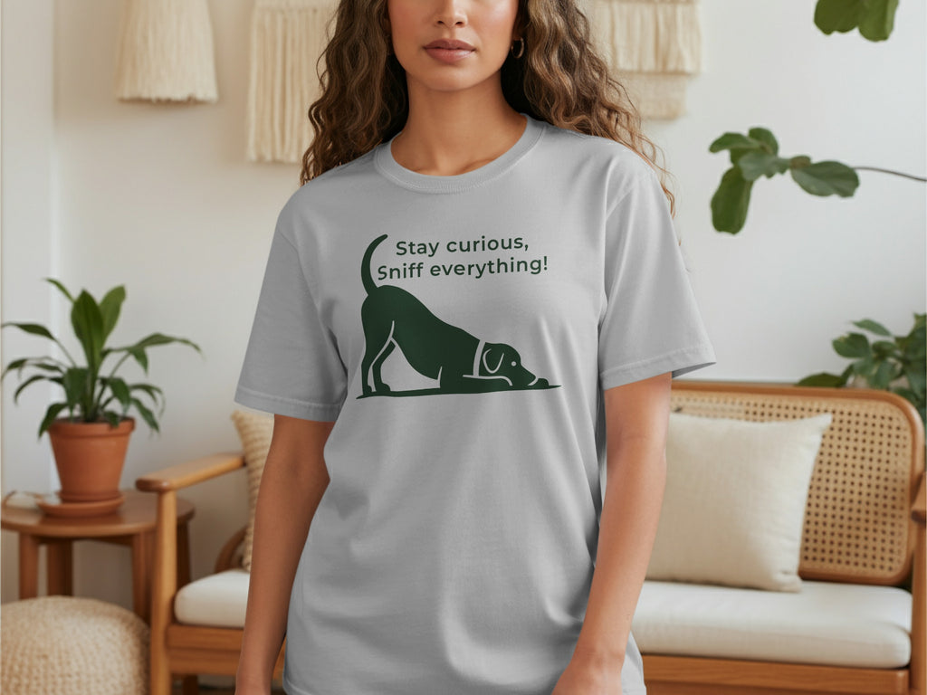 Gray t-shirt with a black dog silhouette and text: "Stay curious, Sniff everything!"