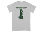 Gray t-shirt with a poodle illustration and text "JUDGING YOU WITH PERFECT POSTURE".