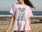 White t-shirt with a cartoon schnauzer and text "SMART. SPUNKY. SCHNAUZY."