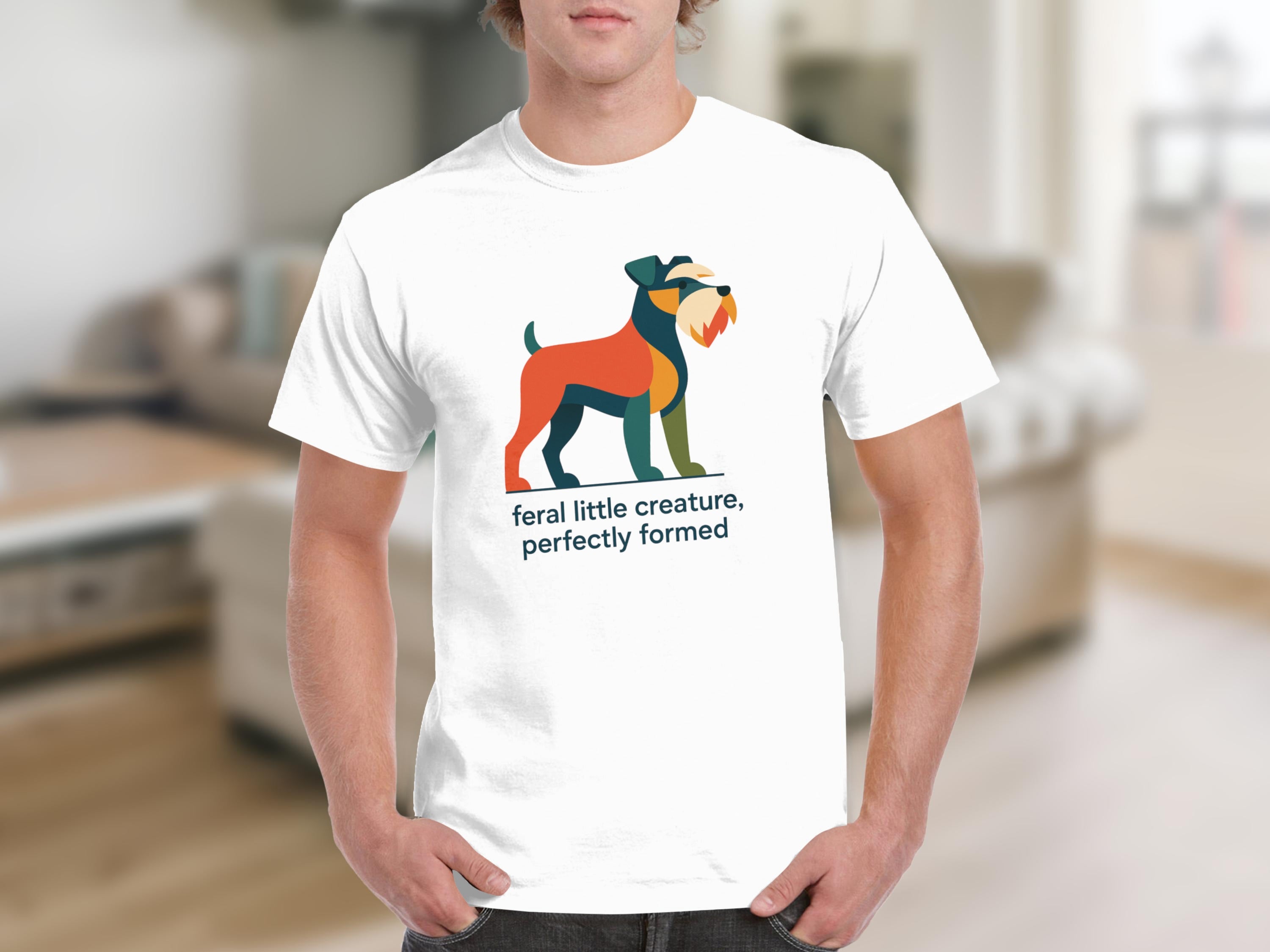 White t-shirt with abstract dog graphic and text "feral little creature, perfectly formed".