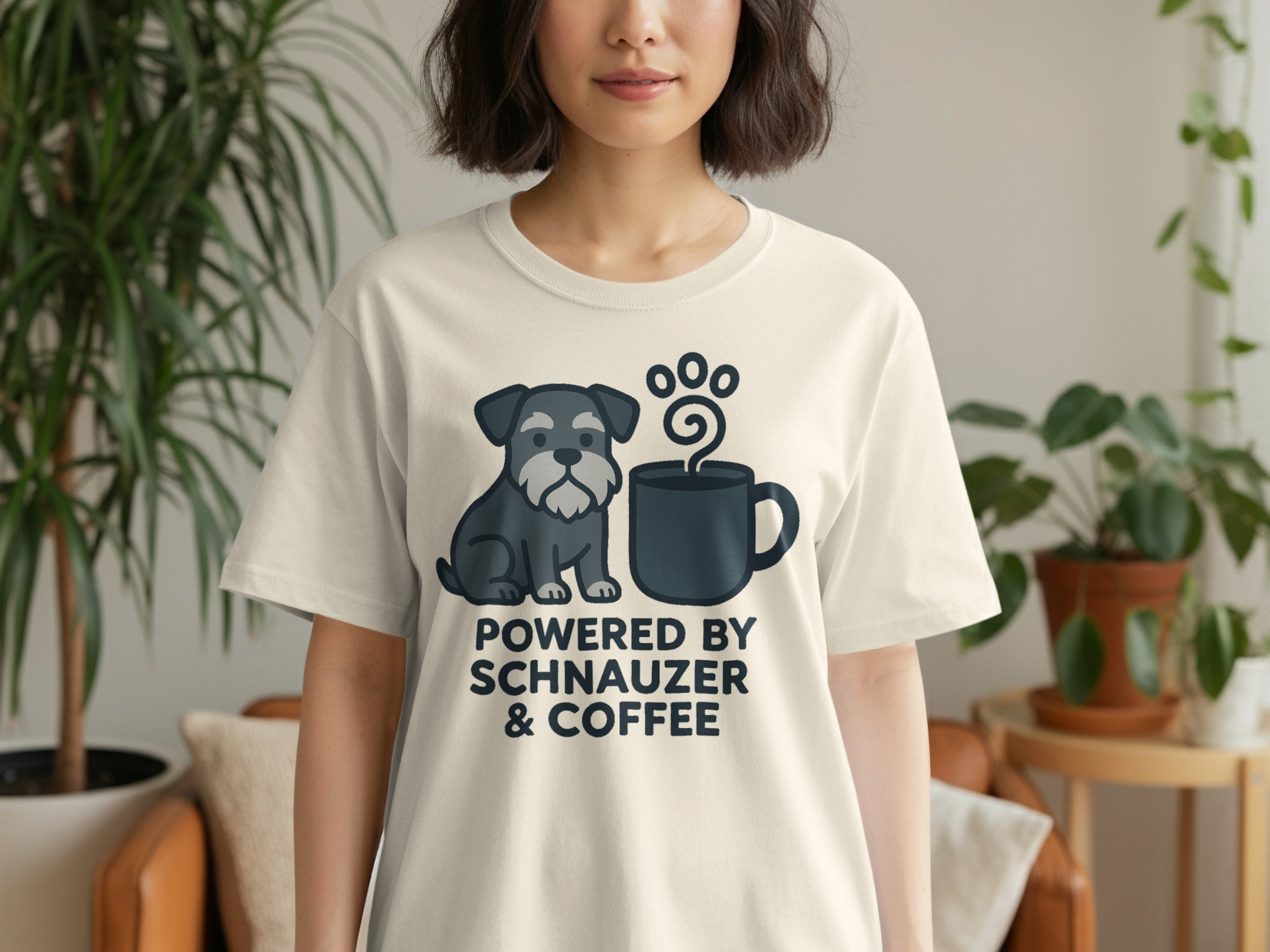Cream t-shirt with Schnauzer and coffee design that reads "Powered by Schnauzer & Coffee".