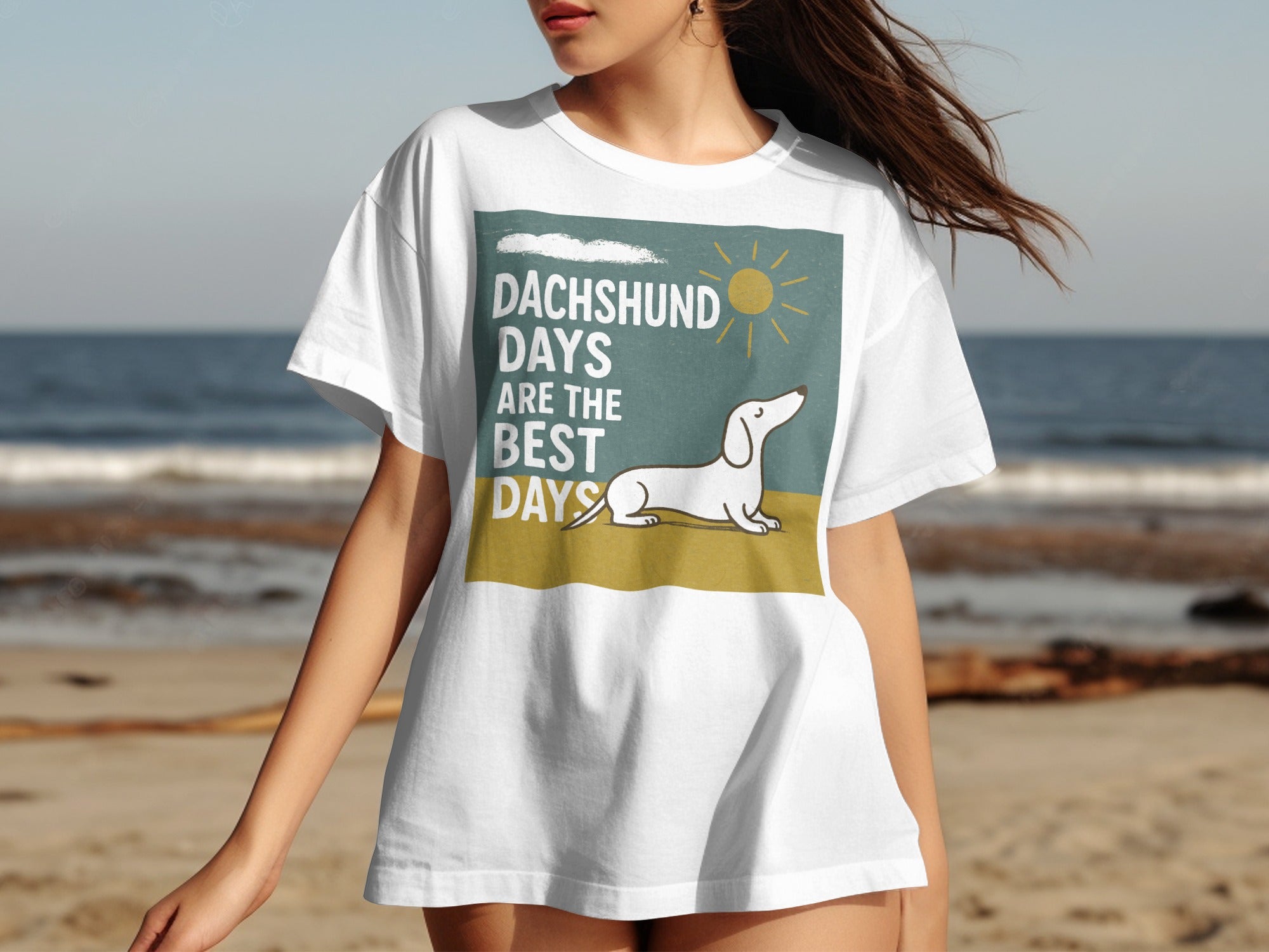 White t-shirt with graphic: a dachshund sunbathing with text "DACHSHUND DAYS ARE THE BEST DAYS".