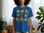 Blue t-shirt with a grid of nine cartoon golden retrievers engaged in outdoor activities.