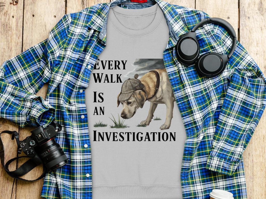 Gray t-shirt with a dog investigating and text "Every Walk is an Investigation".