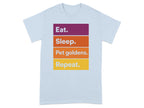 Light blue t-shirt with "Eat. Sleep. Pet goldens. Repeat." text.