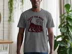 Grey t-shirt with a dark brown graphic of a dog sniffing with text "TRUST THE NOSE".
