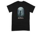 Black t-shirt with dog in forest scene and text "Paws And Reflect".