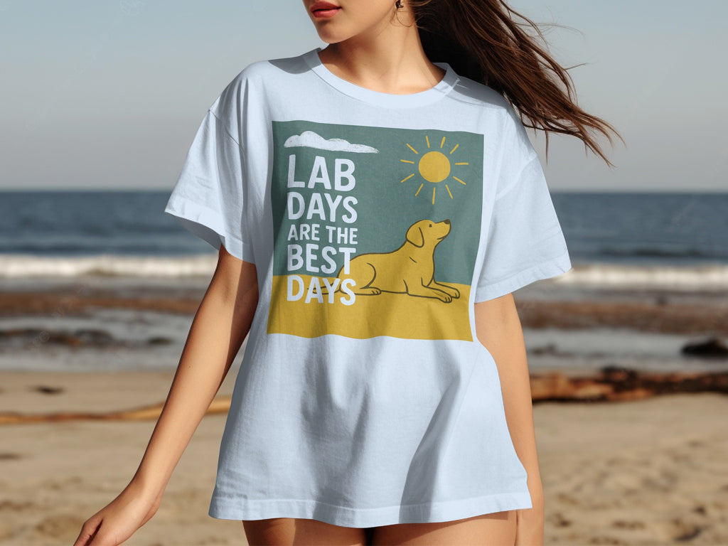 White t-shirt with graphic of yellow lab dog, sun, and text "LAB DAYS ARE THE BEST DAYS".