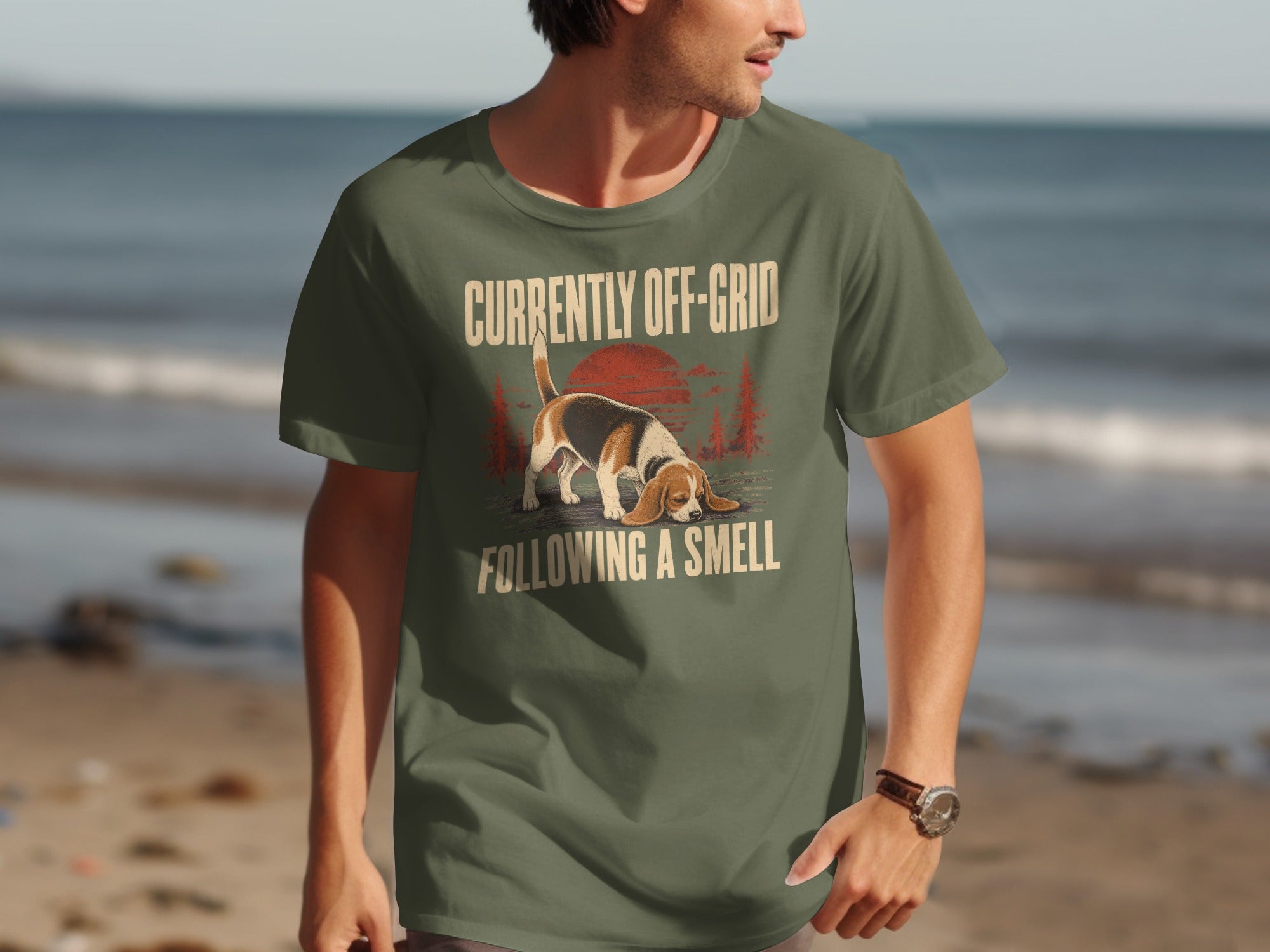 Green t-shirt with beagle dog and text "Currently Off-Grid Following a Smell".