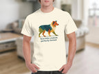 Cream t-shirt with geometric dog graphic and text "feral little creature, perfectly formed".