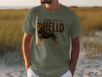 Olive green t-shirt with a dog graphic and "HELLO" text.